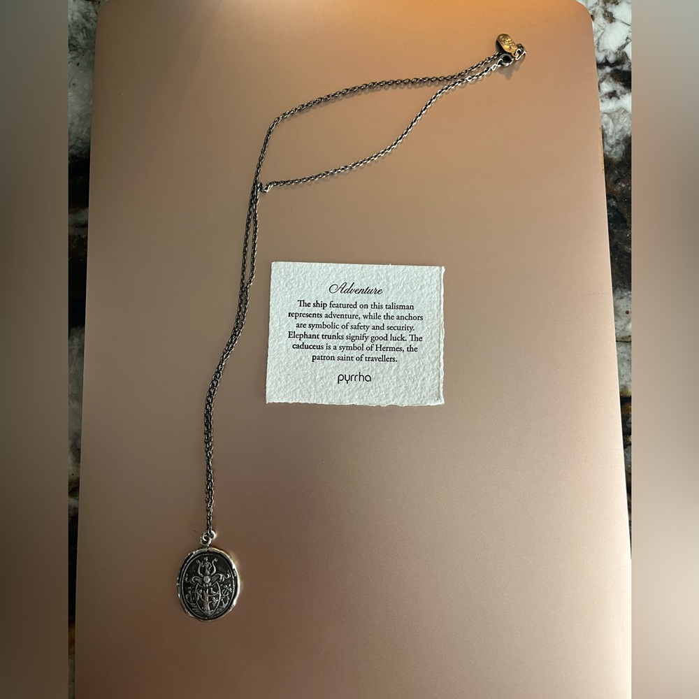 “Adventure” Pyrrha talisman. Retail$289. USD brand new before taxes & shipping.